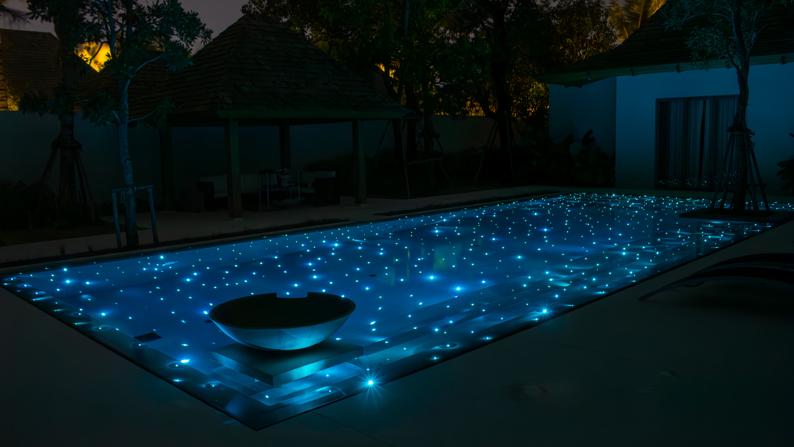 Luxury swimming pool with fiber optic lighting at Phuket resort