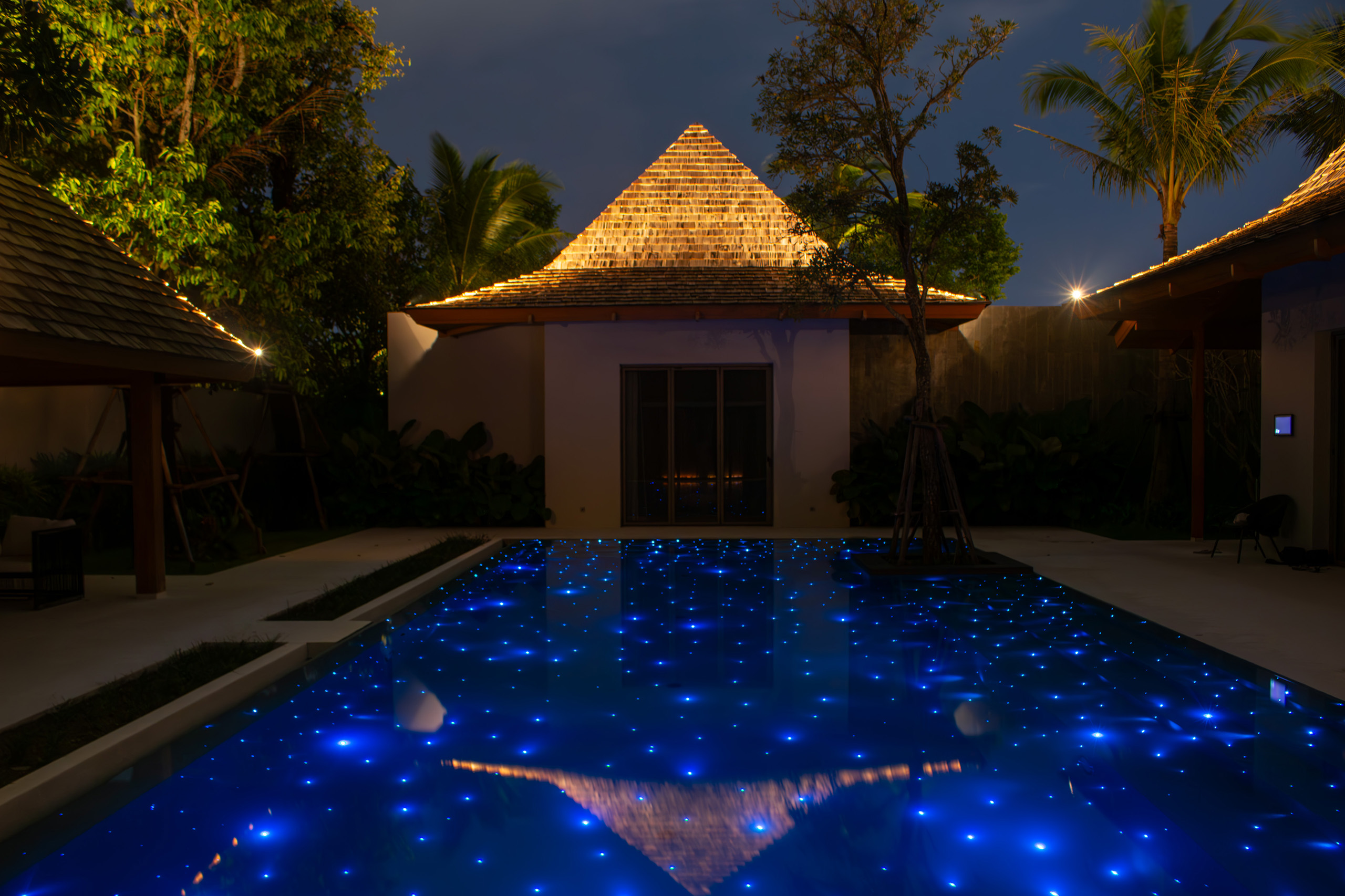 Luxury swimming pool with fiber optic lighting at Phuket resort