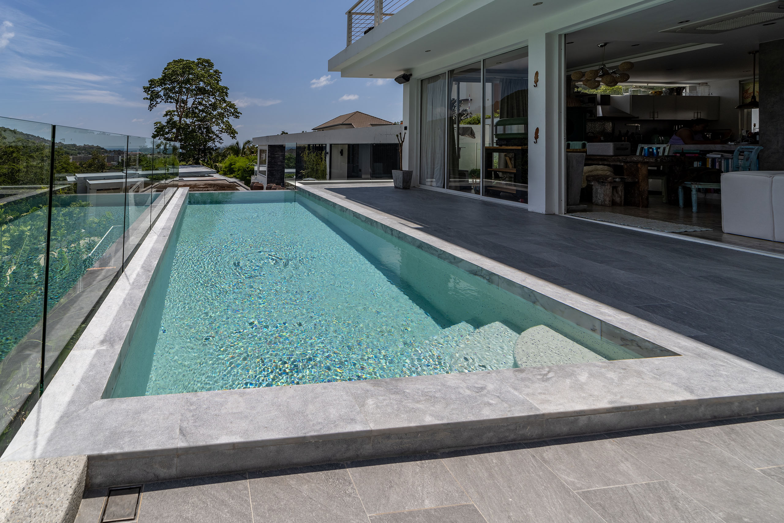 Hotel resort luxury pool with poolside bar and seating area