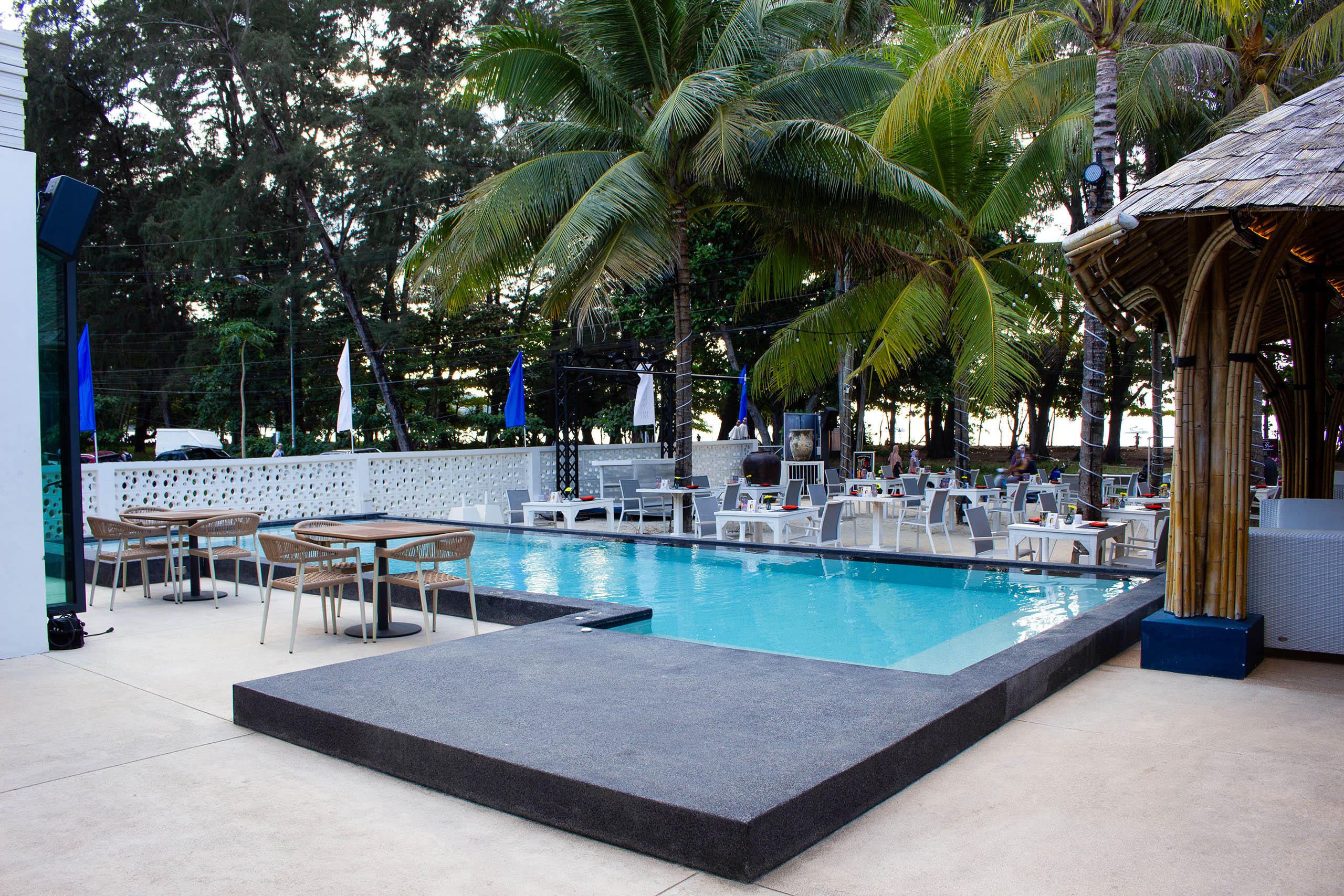 Hotel resort luxury pool with poolside bar and seating area